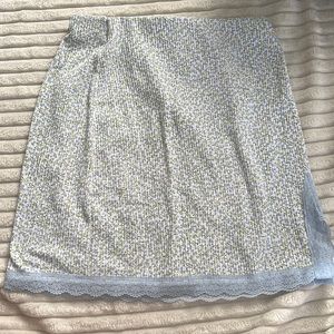 H&M floral printed mini pencil skirt with bby blue lace trim and small slit